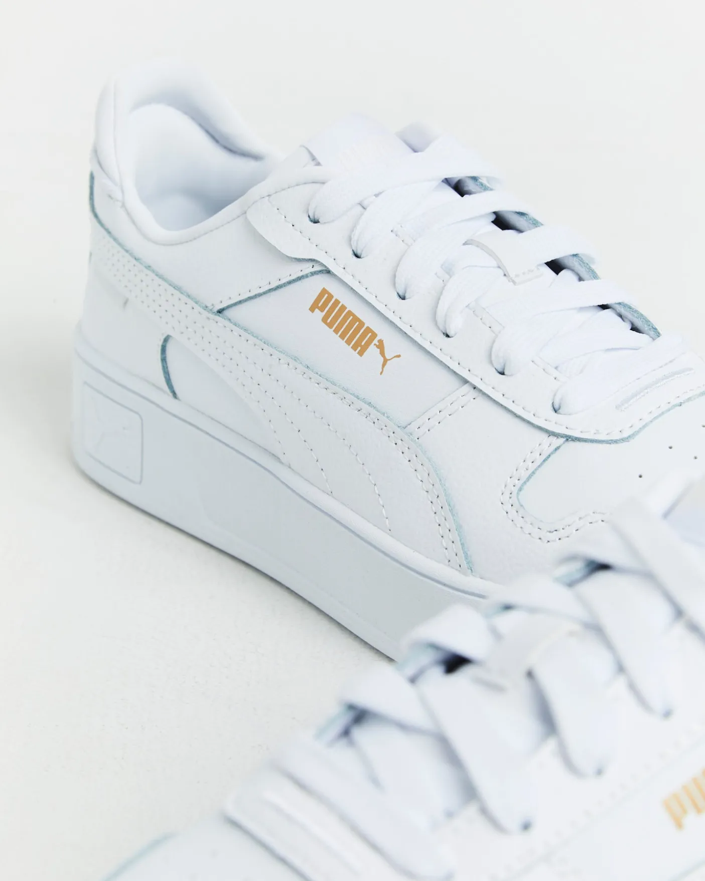 Carina Street Puma Sneakers in White/Gold