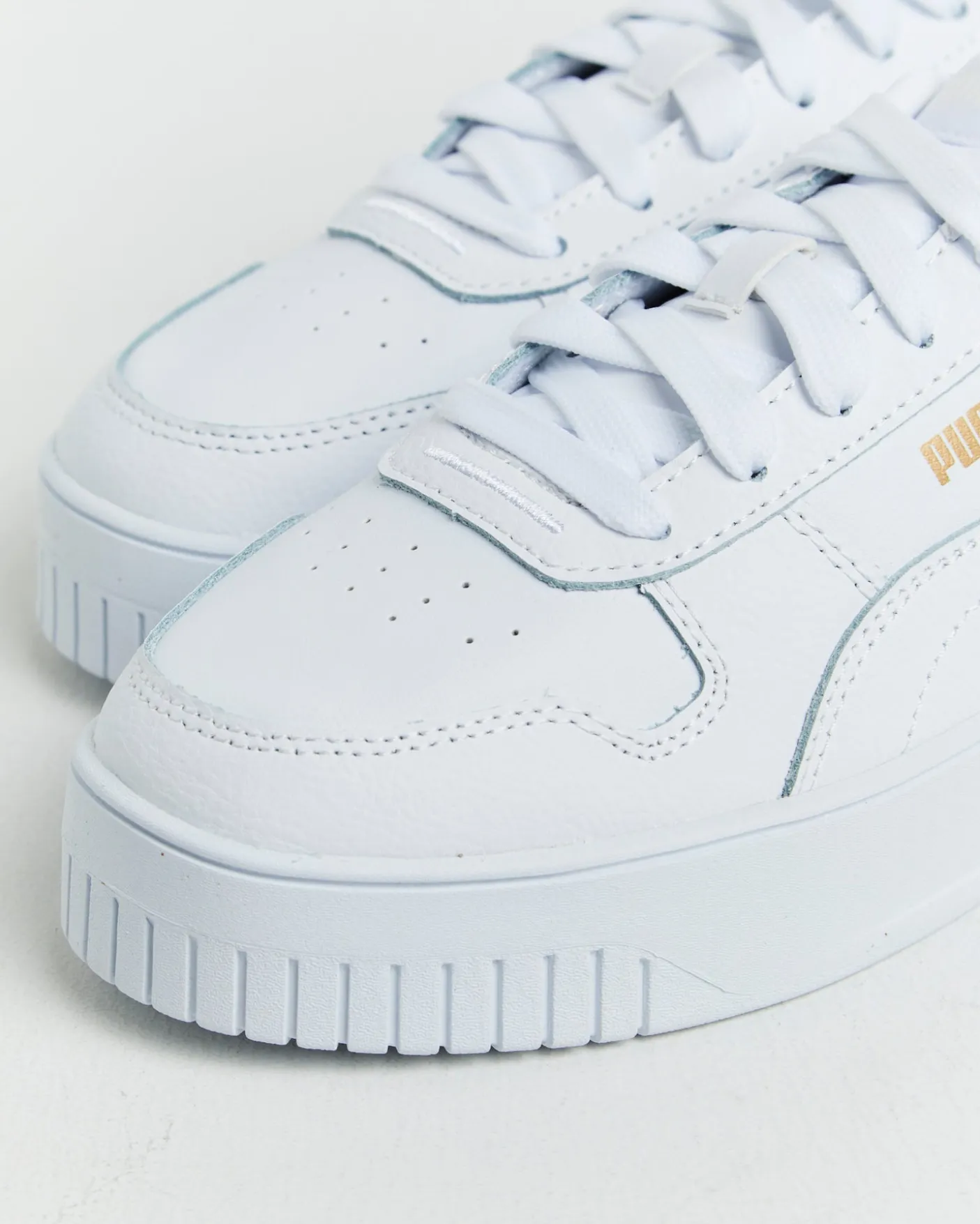 Carina Street Puma Sneakers in White/Gold