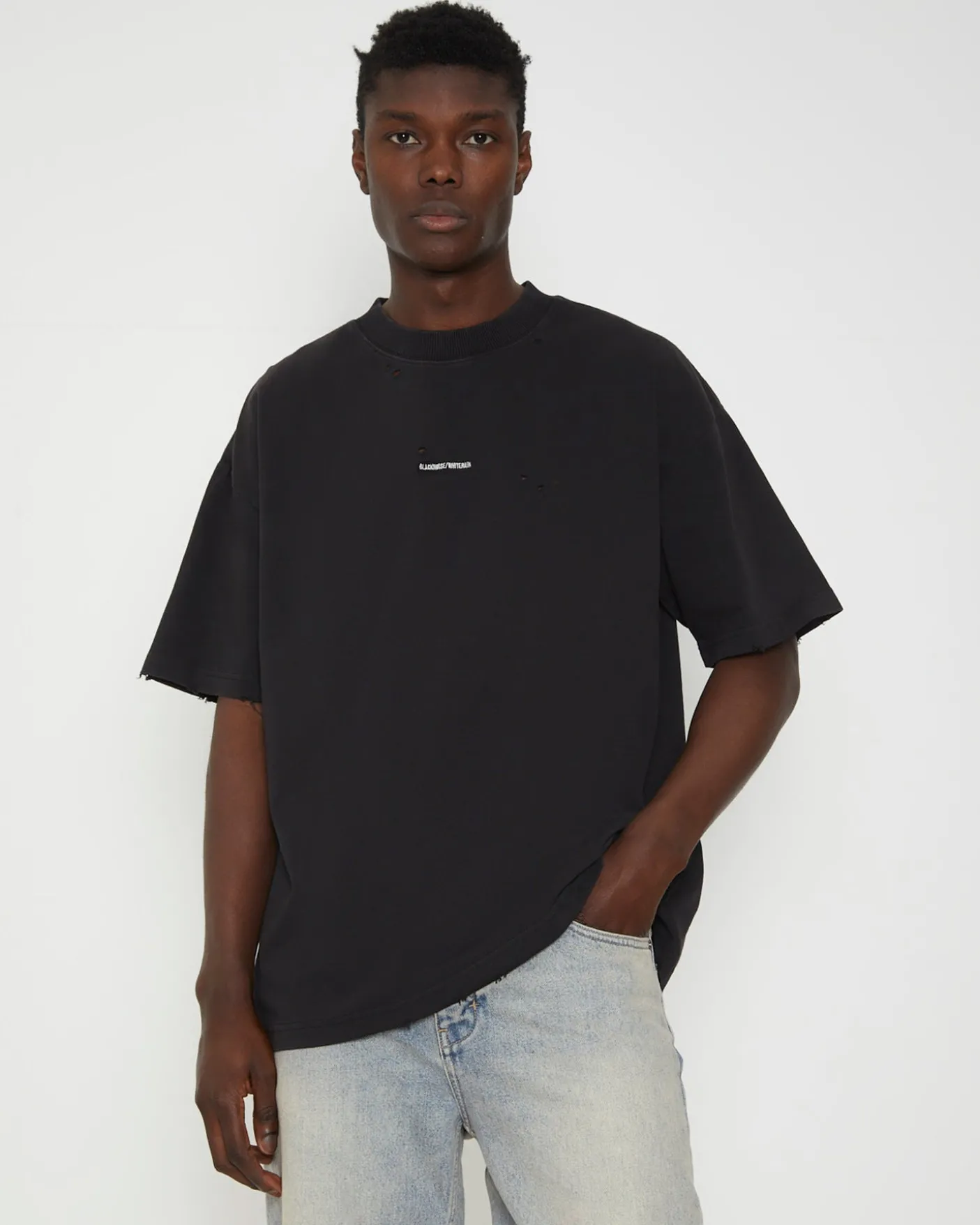 Distressed Logo Short Sleeve T-Shirt in Black